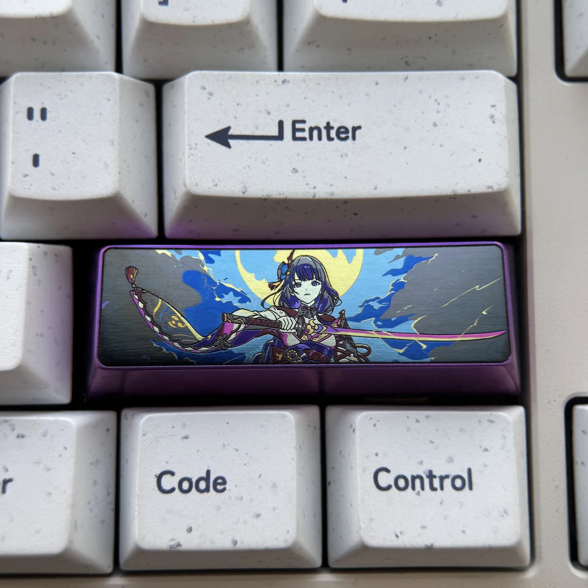 Majestic titanium Raiden Shogun keycap for Genshin Impact, showcasing its premium quality and regal Electro Archon design.