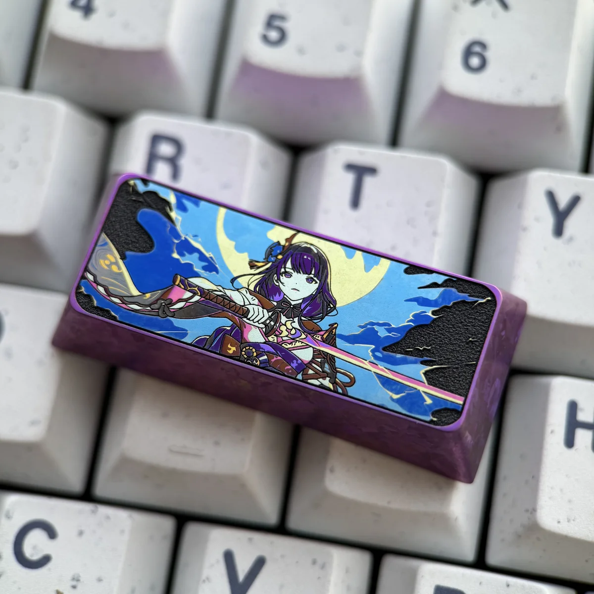 Premium titanium Raiden Shogun Cherry Enter keycap, showcasing ethereal metallic luster and intricate Genshin Impact design from multiple majestic angle.
