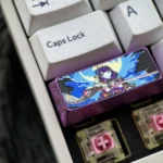 Ethereal Raiden Shogun titanium keycap, premium collectible, displaying intricate character art with metallic luster from a unique angle.
