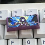 Close-up view of the premium titanium Raiden Shogun keycap, showcasing its ethereal character art and intricate metallic details from a side angle.