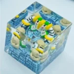 Multiple angles showcasing the exclusive, intricately detailed Regigigas artisan Pokemon keycap, highlighting its colossal power and sculptural artistic design.