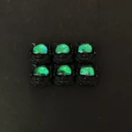 Whimsical handcrafted resin Space Dog keycap, capturing its dynamic iridescent color shift from a unique angle, perfect for ESC.