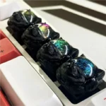 Handcrafted resin Space Dog keycap, a whimsical ESC artisan. Dynamic, iridescent color shifts and intricate details shown from various angles.