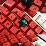 Handcrafted resin Space Dog ESC keycap, artfully photographed from a unique angle, showcasing its whimsical design and dynamic design.