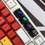 A handcrafted Resin Space Dog Keycap for ESC, featuring dynamic, iridescent colors and a whimsical space adventurer design.