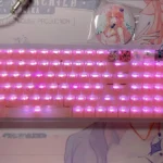 Elegant Ribbon Keycap for keyboards, presented from multiple angles, showcasing its unique character-inspired design and intricate design.