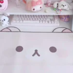 Unique view of Rilakkuma Charm waterproof leather desk mat with playful Rilakkuma on pastel, highlighting kawaii design.