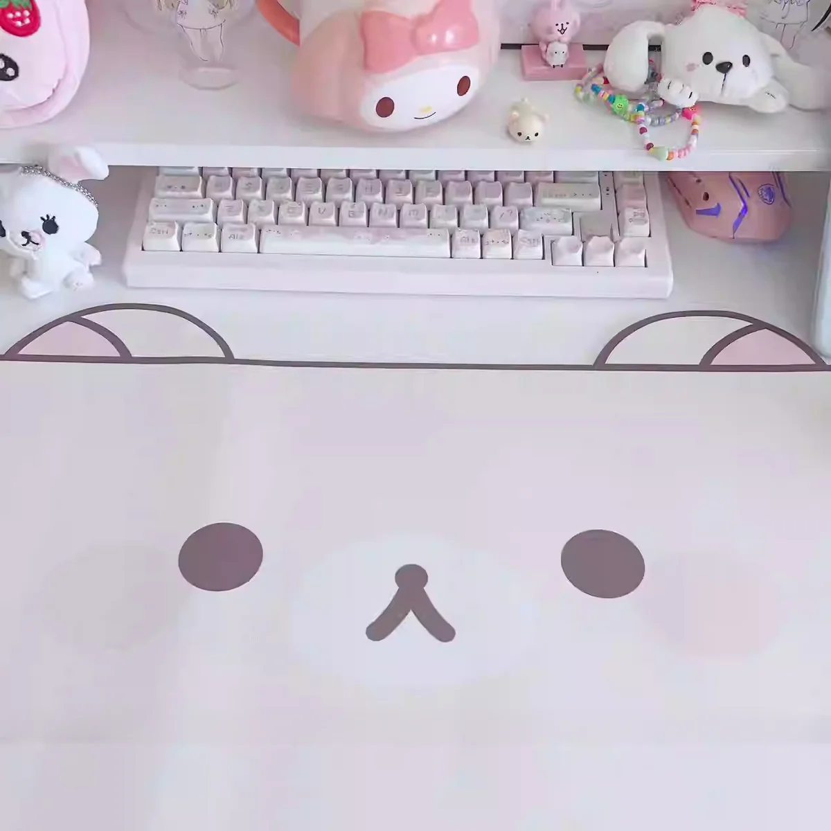 Unique view of Rilakkuma Charm waterproof leather desk mat with playful Rilakkuma on pastel, highlighting kawaii design.