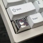 Close-up of the exclusive Rin Tohsaka titanium keycap, showcasing its sleek anodized finish and intricate Fate/Stay Night character art, perfect for fans.