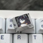 Premium Rin Tohsaka Titanium 1.25U keycap, shown from multiple angles, reveals its sleek anodized finish and intricate Fate/Stay Night character details.