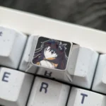 Premium Rin Tohsaka titanium keycap for gaming, meticulously crafted with an anodized finish and intricate Fate/Stay Night anime details.