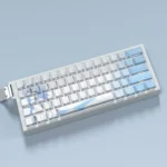 Close-up of exclusive Roxy Migurdia PBT side-lit keycaps set, showcasing the vibrant Mushoku Tensei anime art and elegant illumination from a unique angle.