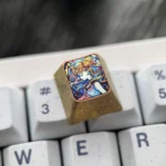 A close-up view of the iconic Sailor Moon Titanium Shattered Glass Keycap, showcasing its vibrant anime design and unique cosmic artistry from a difference side.