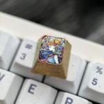 Detailed view of the iconic Sailor Moon Titanium Shattered Glass Keycap, highlighting the vibrant anime design and unique shattered finish with cosmic.