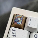 A captivating detail shot of the iconic Sailor Moon Titanium Shattered Glass Keycap, emphasizing its vibrant anime artistry and unique cosmic shatter.