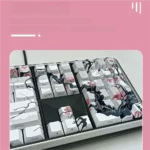 Premium Sakura side-lit PBT keycap set, highlighting the delicate cherry blossom design and luminous side-lit legends from a detailed perspective.