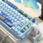 Artistic Scenic PBT Keycaps Set featuring tranquil lakes and majestic mountains. Detailed dye-sub print captures the serene Chinese ink wash landscape design.