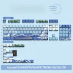 Artistic PBT dye-sub keycaps set featuring serene Chinese landscape art, tranquil lakes, and majestic mountains, captured from a unique angle.