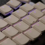 A collection of Sleek Low Shaft Supplement Keycap Set displayed from various angles, highlighting their sleek translucent design and vibrant potential for customization.