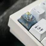 Detailed view of the Van Gogh Starry Night Titanium ESC keycap, capturing the swirling cosmic art and celestial wonder from a distinct perspective.