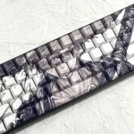 Explore the iconic Straw Hat Keycap Set gallery, revealing its playful side-engraved anime character design and vibrant backlit PBT material from all angles.