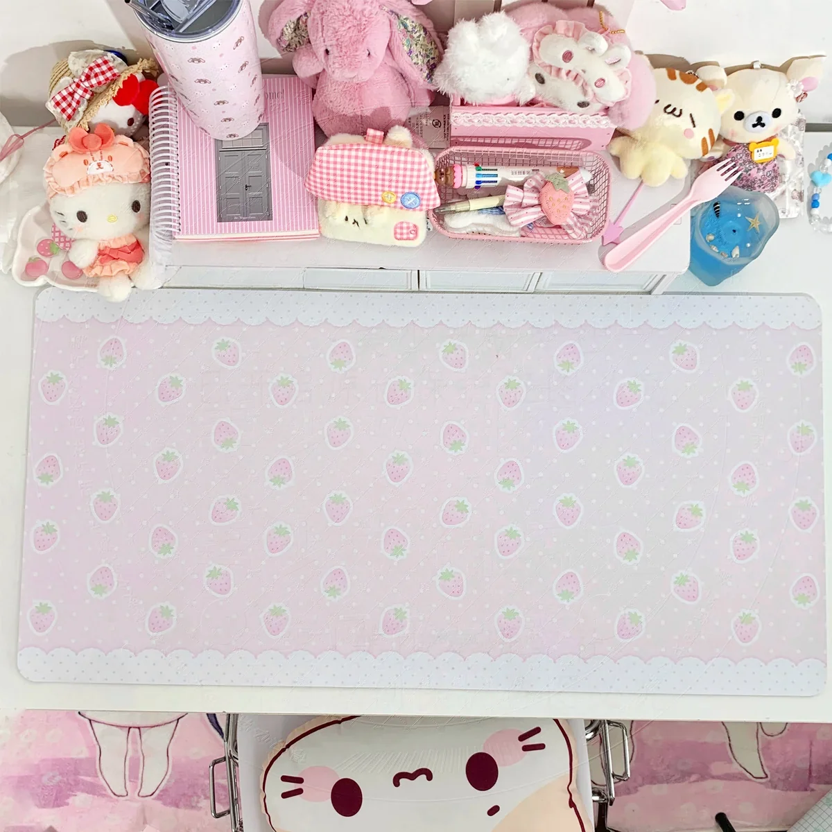 Charming strawberry desk mat from multiple angles, highlighting its vibrant sweet motif and dual material options for a cheerful, aesthetic design.