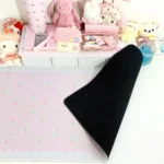 Strawberry Desk Mat displayed at an angle, highlighting its charming sweet strawberry motifs and dual material options for a cheerful, playful setup.