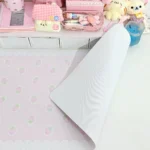 Charming strawberry design on a luxurious leather desk mat, perfect as an oversized mouse pad. Adds a playful, sweet touch to any workspace.