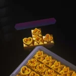 Durable poker suits keycap, shown from various angles, featuring a sleek metallic finish and iconic poker card suit engravings for gaming enthusiasts.