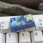 Iconic Super Saiyan Blue Vegeta Titanium Keycap, showcasing its vibrant metallic blue finish and intricate details from a powerful angle. A premium 2u keycaps.