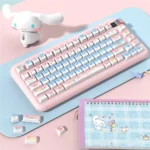 Cinnamoroll keycaps set displayed from multiple angles, highlighting the dreamy pastel gradient PBT design with a sweet blue-pink aesthetic.