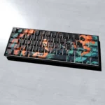 Multiple views of the premium Tanjiro Demon Slayer side-engraved PBT backlit keycap set, showcasing its iconic artistic details and vibrant glow.