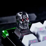 Terminator T800 artisan resin keycap. Iconic cybernetic design with a metallic finish, optimized for top light position.