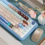 Titanic Keycap Set, MDA Profile PBT, shown from multiple angles. Features elegant ocean liner aesthetics, deep sea tones, with historical design.