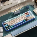 Titanic keycaps set, PBT Cherry profile. Nostalgic deep blue ocean theme with iconic ship motifs, highlighting durability and vintage elegance.