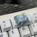 Handcrafted Mystical Cat Titanium Artisan Keycap for keyboards, featuring shimmering titanium and celestial cat starry night, shown from various angle.