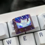 Artisan Cosmic Purple Starry Sky Titanium Keycap showcased from various angles, revealing its handcrafted detail, premium titanium glow, and cosmic design.
