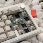 Premium CNC aluminum 67-key V65 mechanical keyboard, highlighting its sleek, compact design and dual-mode versatility from various angles.