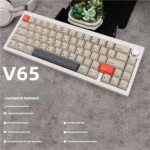 Elite CNC Aluminum 67-Key V65 Mechanical Keyboard. This premium, compact dual-mode keyboard features a sleek, minimalist design, perfect for a refined design.