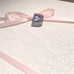 Close-up of a handcrafted Valorant Fade Prowler keycap, showcasing its dark, spectral design from a unique angle, highlighting intricate artisan details.