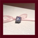 Mysterious Valorant Fade Prowler artisan keycap, handcrafted with intricate detail, captured from a unique perspective to highlight its dark design.