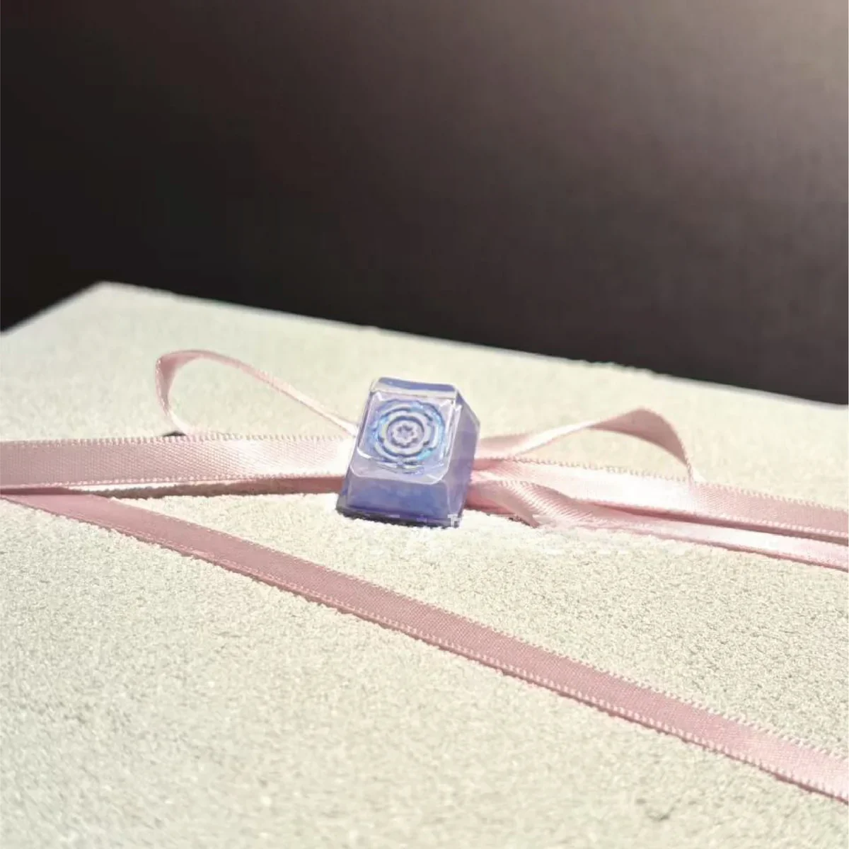 A dynamic, energy-infused handcrafted Valorant Iso Skill artisan keycap, perfectly capturing Iso's power for enthusiasts.