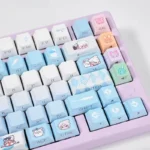 Detailed gallery showcasing premium Valorant Jett PBT keycaps set from various angles. Features dynamic blue/white design and crisp side-illuminated legend.