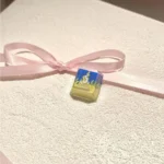 Vibrant, handcrafted Valorant Neon Q Skill artisan keycap showcasing electrifying energy and dynamic in-game essence. A unique collectible.