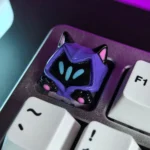Playful Omen Cat Ear Paw Valorant SA Profile keycap, multi-angle view. Highlights shadowy Omen design, vibrant pink cat ears, and whimsical design.