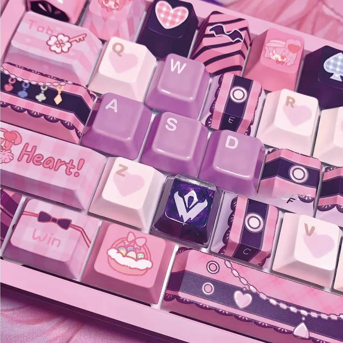 Close-up of a handcrafted Valorant Omen X Skill artisan keycap, showcasing its spectral power design and dark, mysterious aesthetic from a unique angle.