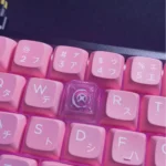 A handcrafted Valorant Reyna Skill keycap, shown from multiple angles, highlighting its dynamic character art, vibrant glow, and fierce aesthetic.