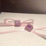 Handcrafted Valorant Reyna Skill keycap from multiple angles, showcasing vibrant backlit details and dynamic character art. Fierce, captivating gaming art.