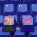 Vortex Series Keycaps. Premium artisan piece with dynamic swirling patterns and shimmering, color-shifting luster.