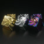 Vortex Series Keycaps crafted from premium zinc-aluminum alloy, displaying dynamic swirling patterns and a captivating color-shifting luster.